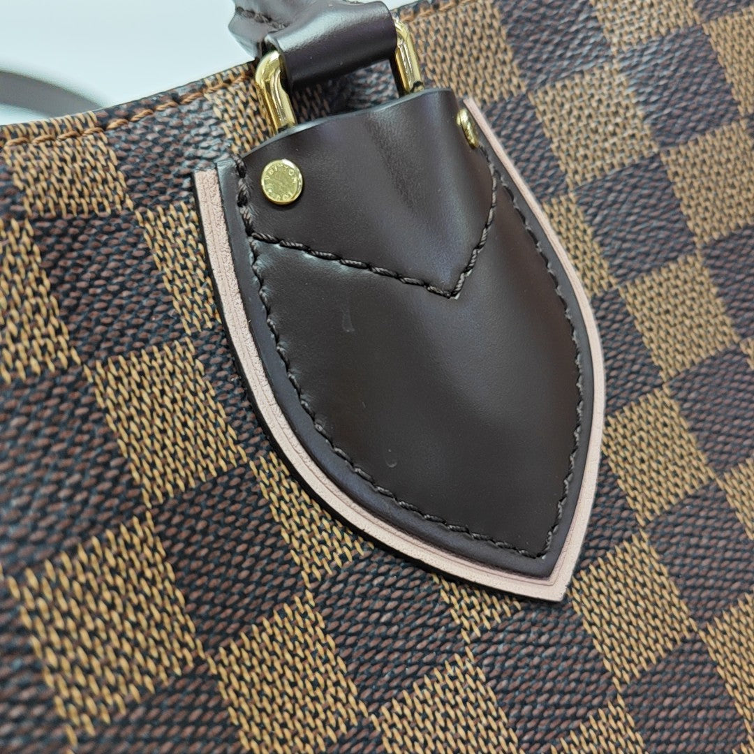 NORMANDY Damier Ebene Coated Canvas Brown