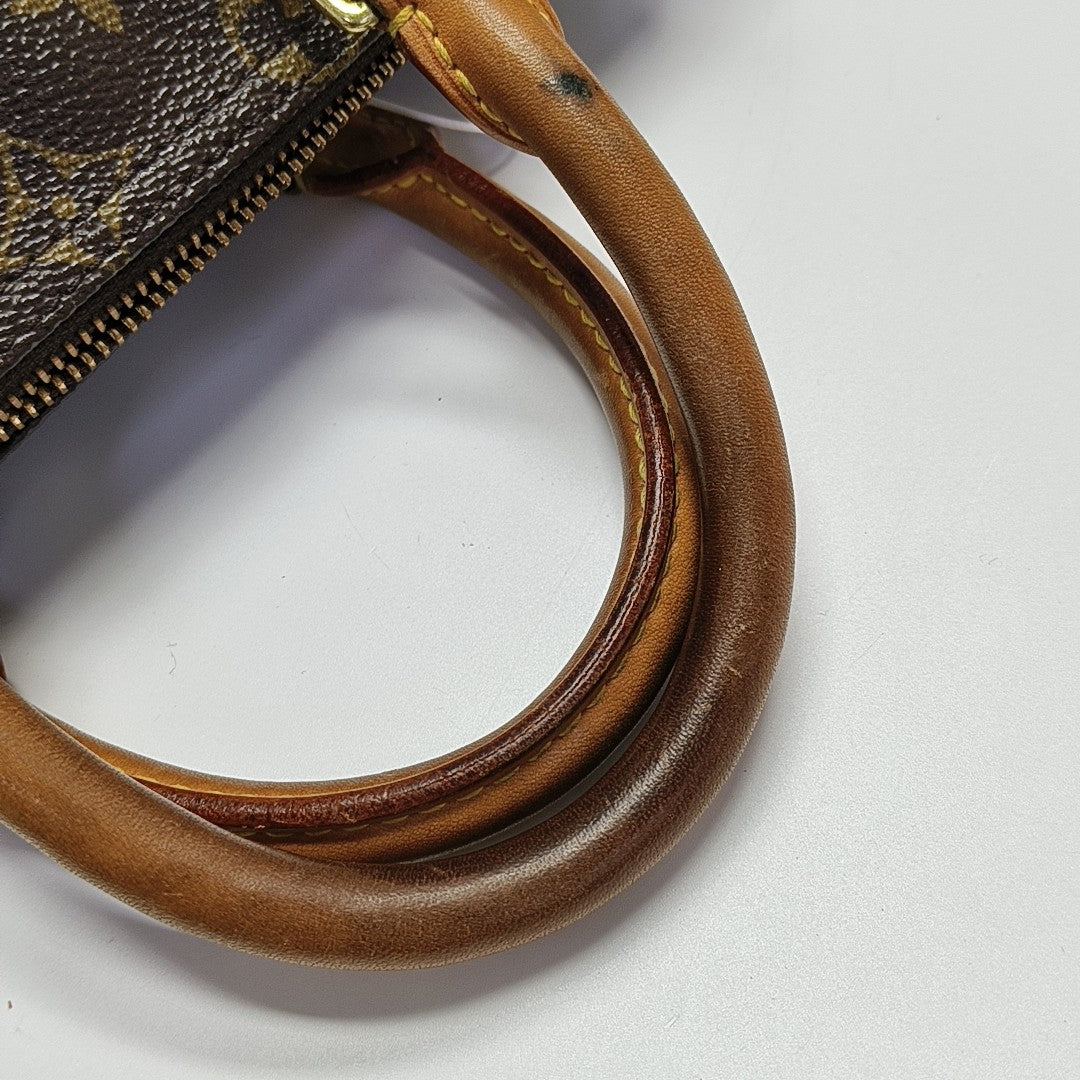 SPEEDY 25 Monogram Coated Canvas Brown