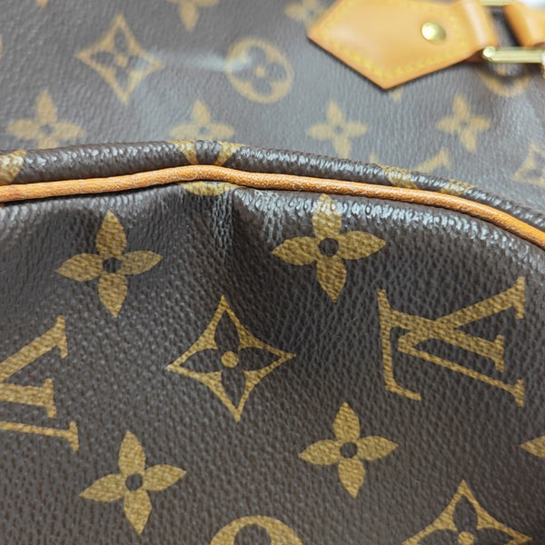 SPEEDY 25 Monogram Coated Canvas Brown