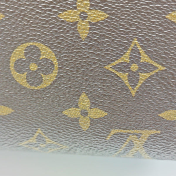 VICTOIRE Monogram Coated Canvas Brown