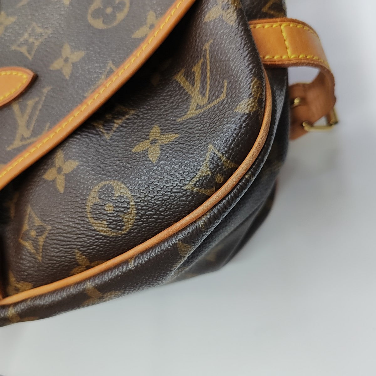 SAUMUR Monogram Coated Canvas Brown