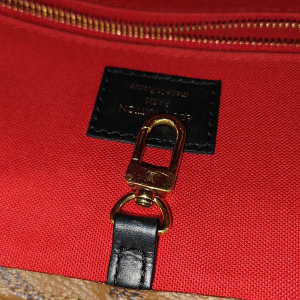 ONTHEGO MM Monogram Coated Canvas Brown