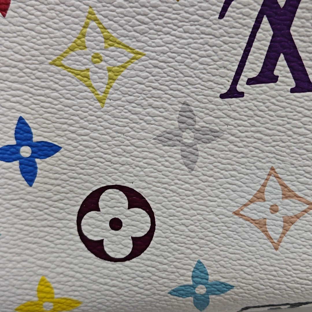 LV × TM ELIZA Monogram Coated Canvas White