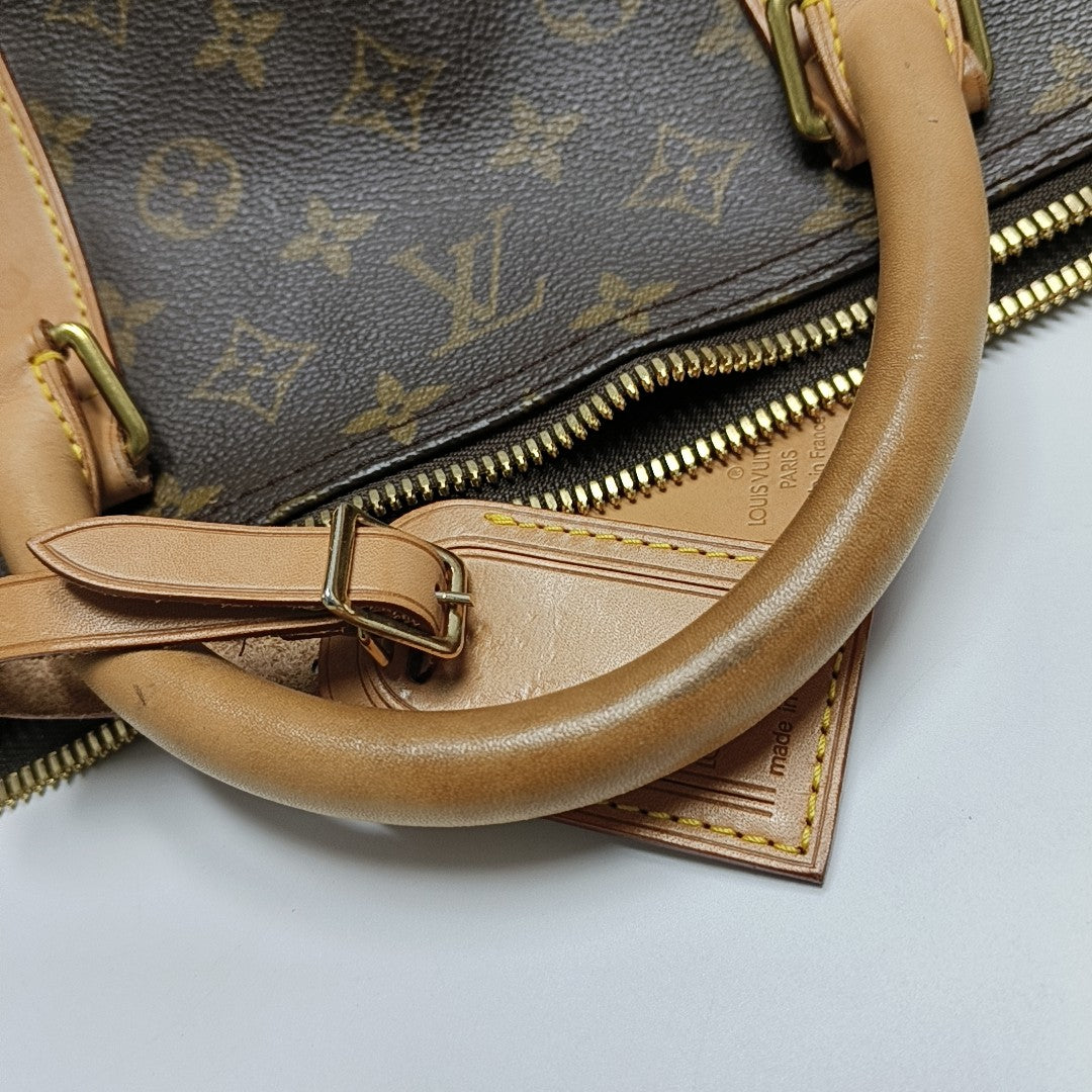 KEEPALL 60 Monogram Coated Canvas Brown