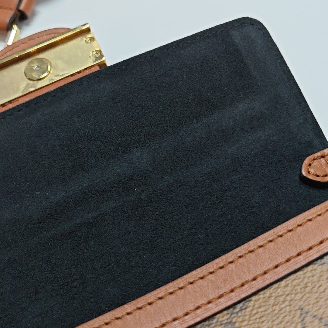 DAUPHINE Monogram Coated Canvas Brown