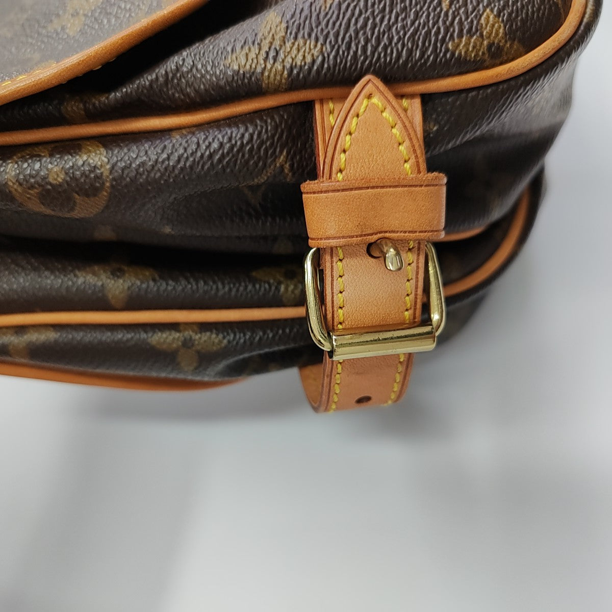 SAUMUR Monogram Coated Canvas Brown