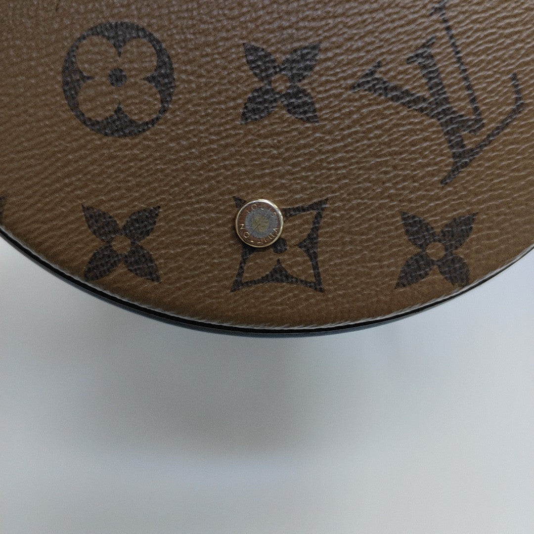 CANNES PM Monogram Coated Canvas Brown