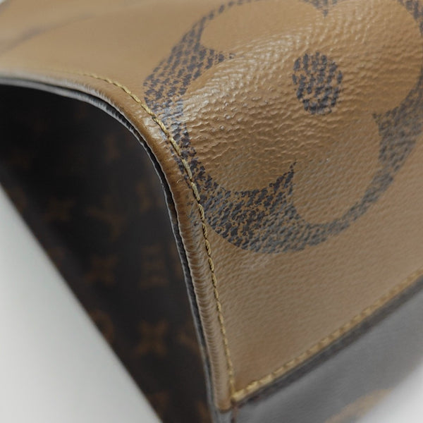 ONTHEGO MM Monogram Coated Canvas Brown