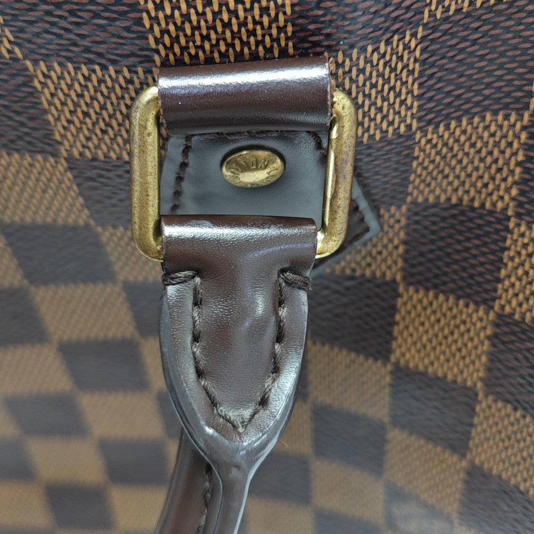 SPEEDY 25 Damier Ebene Coated Canvas Brown