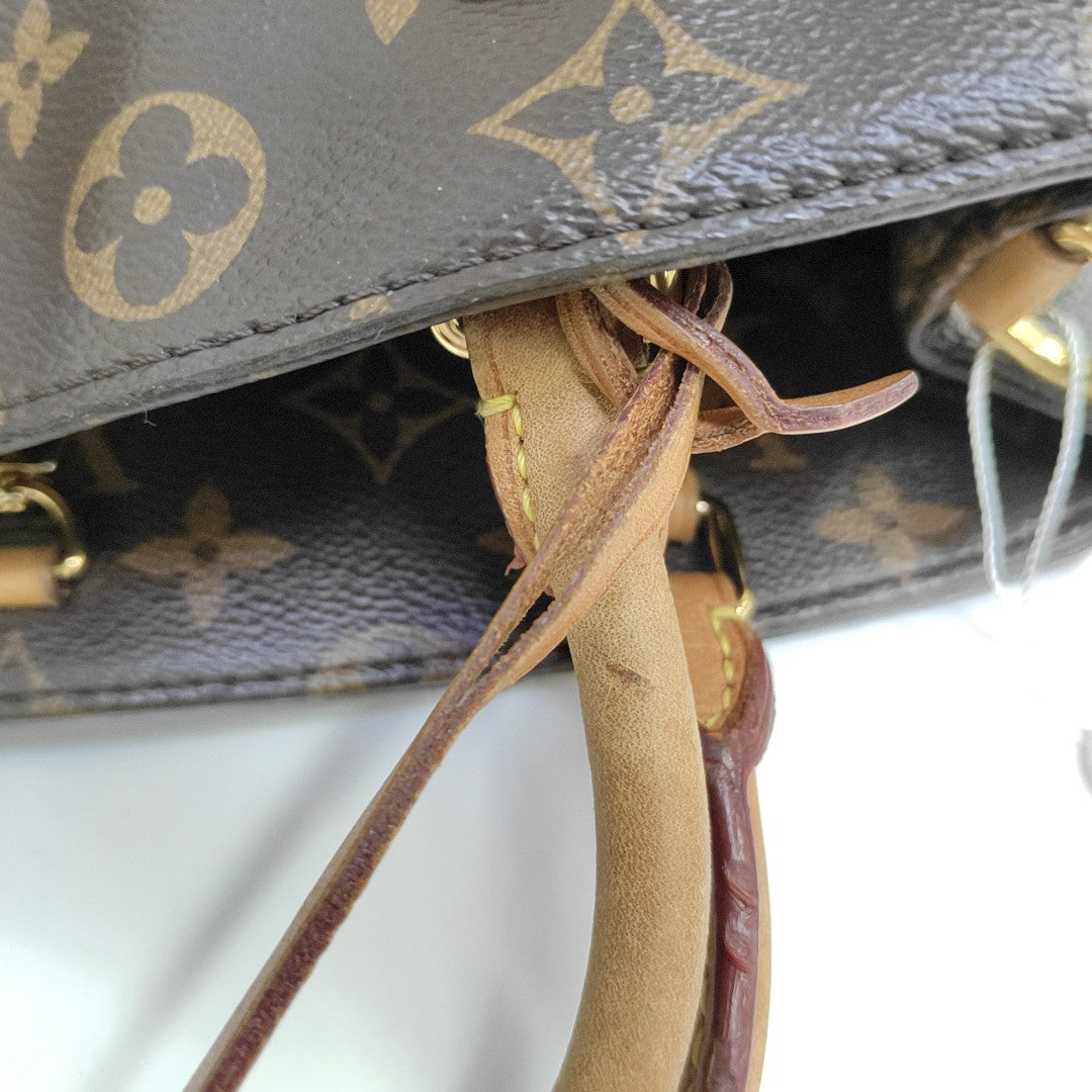 MONTAIGNE Monogram Coated Canvas Brown