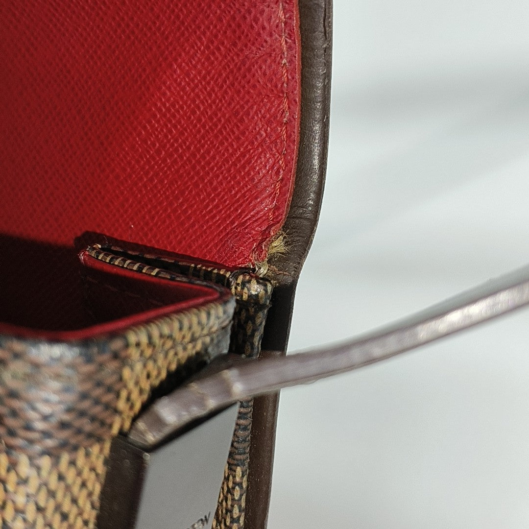 TRIBECA Damier Ebene Coated Canvas Brown