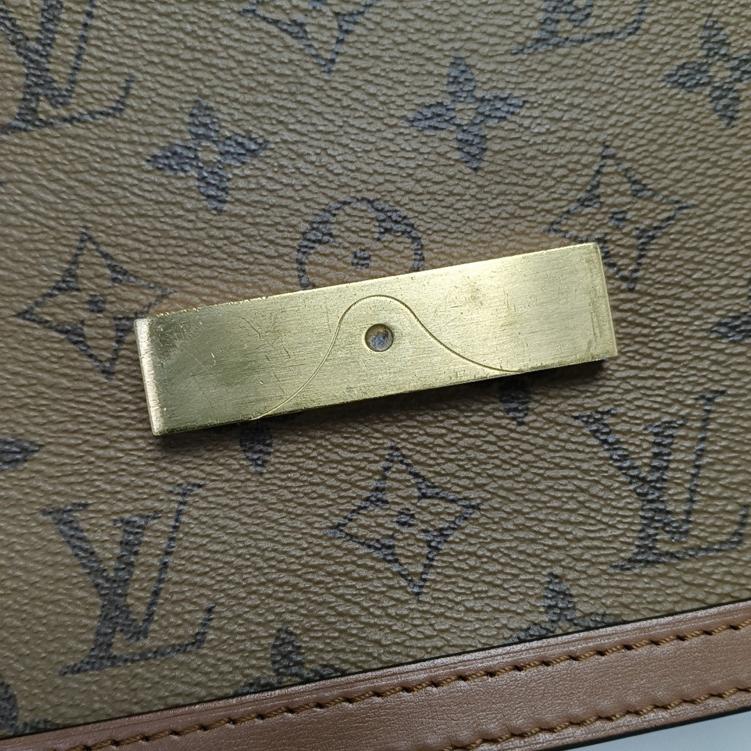 DAUPHINE MM Monogram Coated Canvas Brown