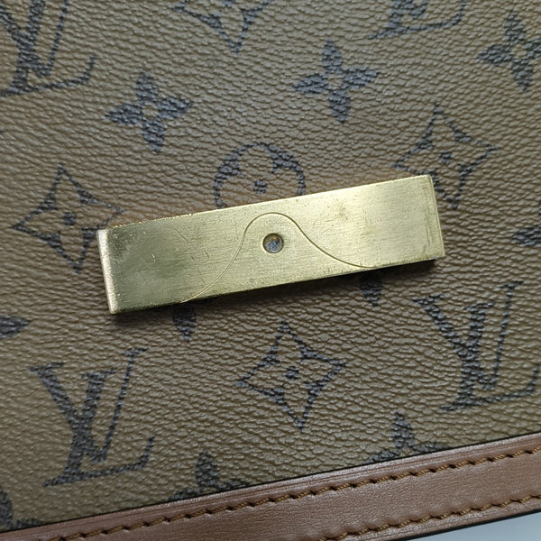 DAUPHINE MM Monogram Coated Canvas Brown