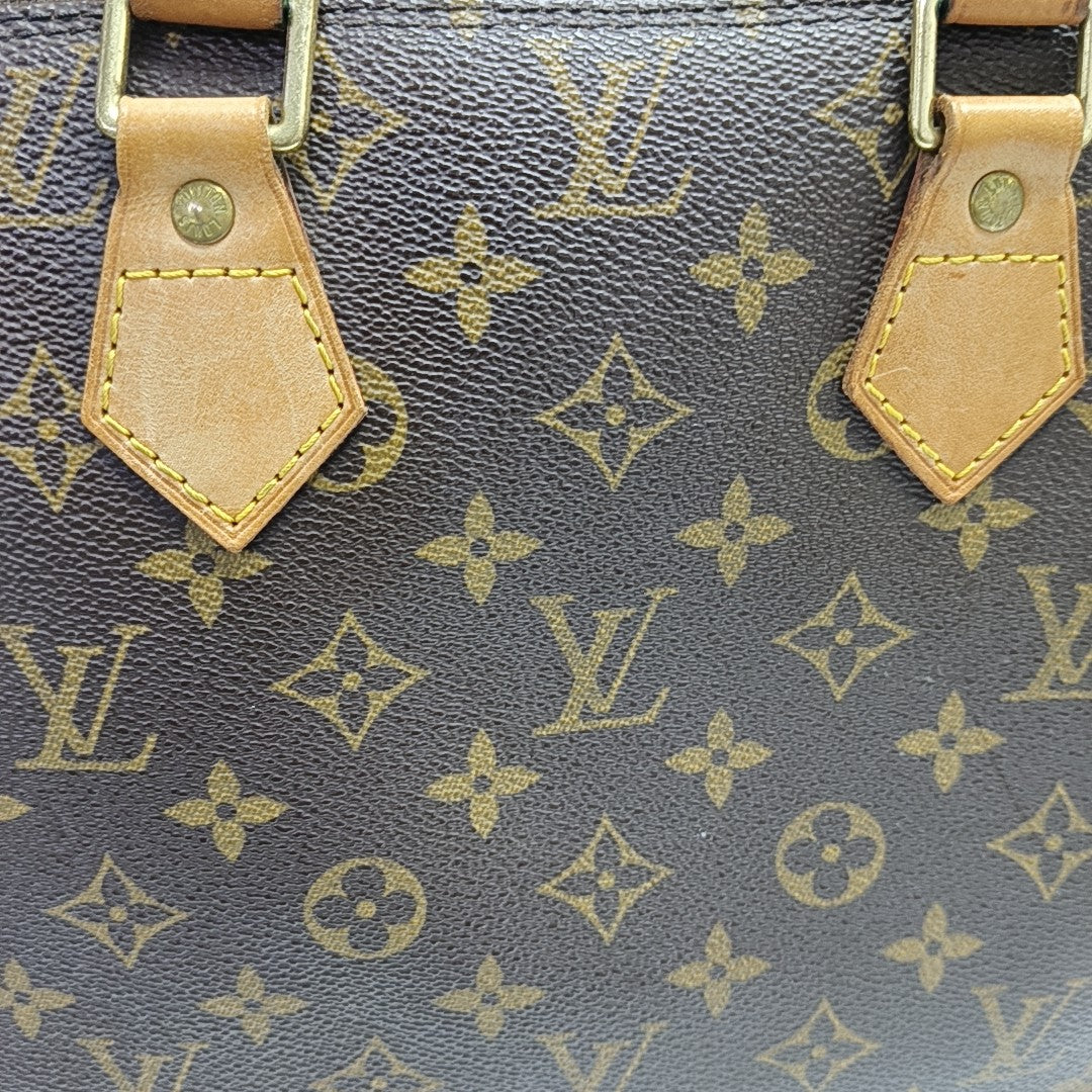 ALMA PM Monogram Coated Canvas Brown