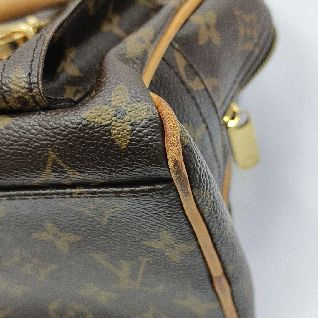 MANHATTAN GM Monogram Coated Canvas Brown