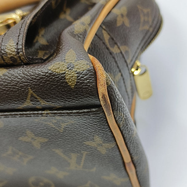 MANHATTAN GM Monogram Coated Canvas Brown