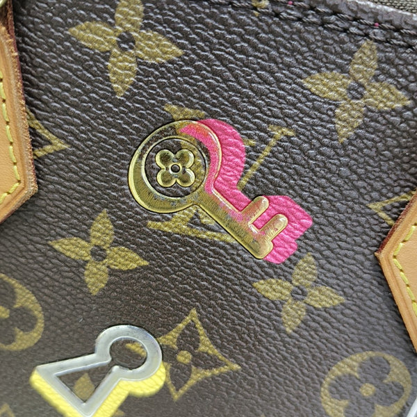 ALMA BB Monogram Coated Canvas Brown