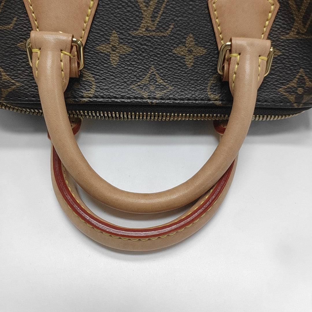 SPEEDY 20 Monogram Coated Canvas Brown