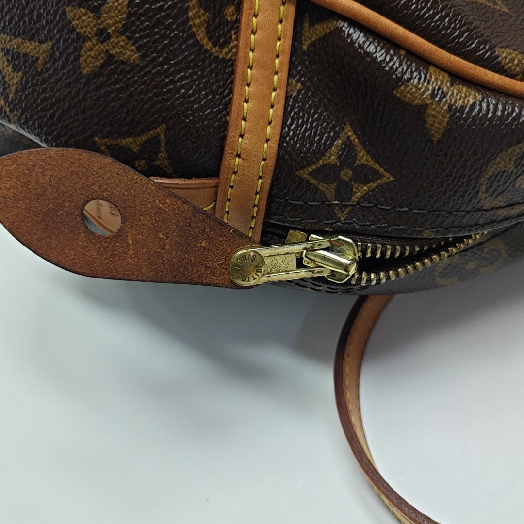 MONTORGUEI PM Monogram Coated Canvas Brown