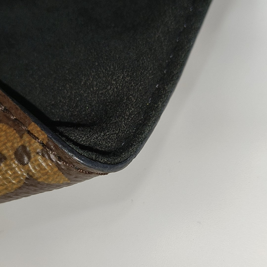 DUFFLE Monogram Coated Canvas Brown