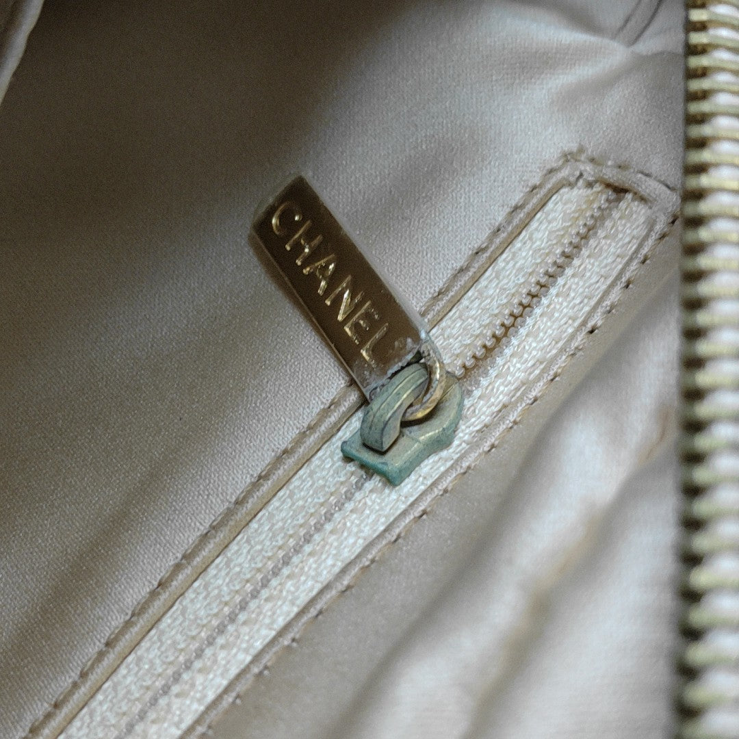 CHANEL PETITE Quilted Grained Calfskin Beige