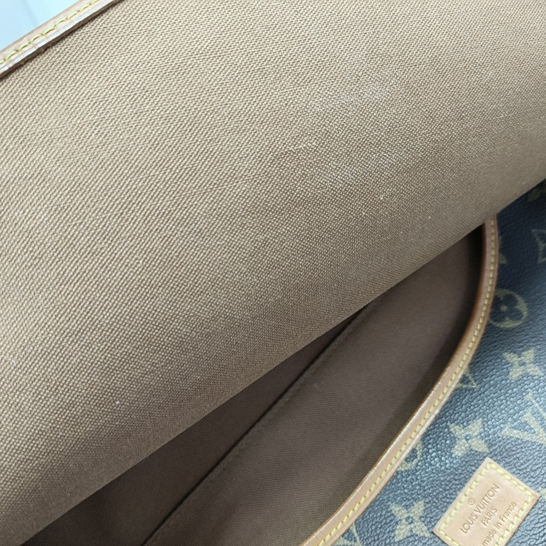 SAUMUR 35 Monogram Coated Canvas Brown