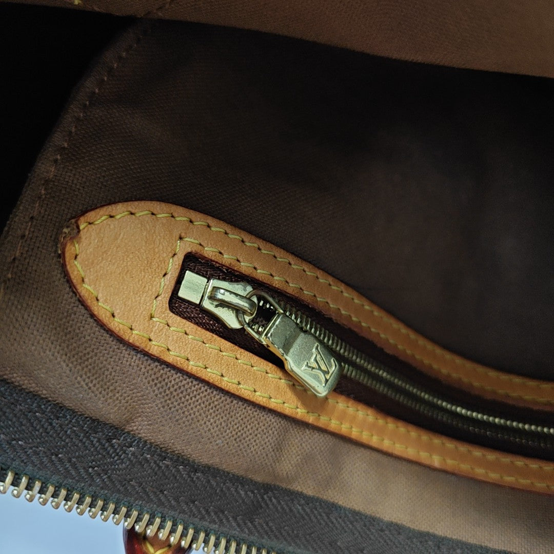 SPEEDY 30 Monogram Coated Canvas Brown