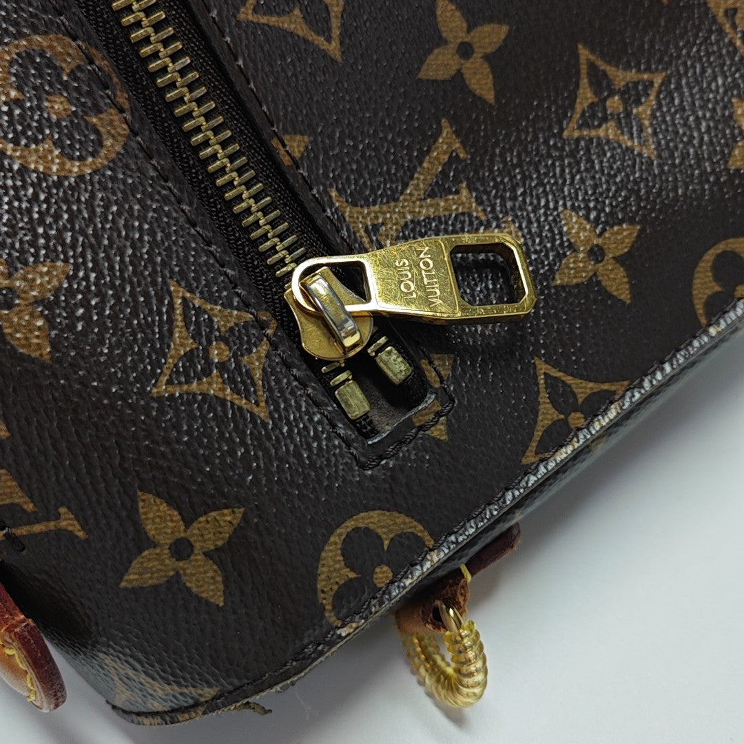 MÉTIS MM Monogram Coated Canvas Brown