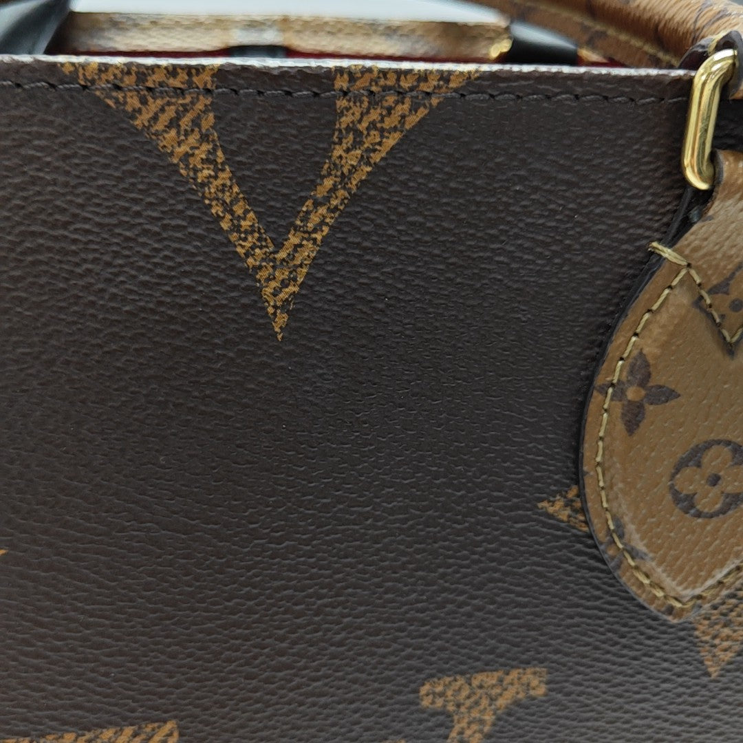 ONTHEGO MM Monogram Coated Canvas Brown
