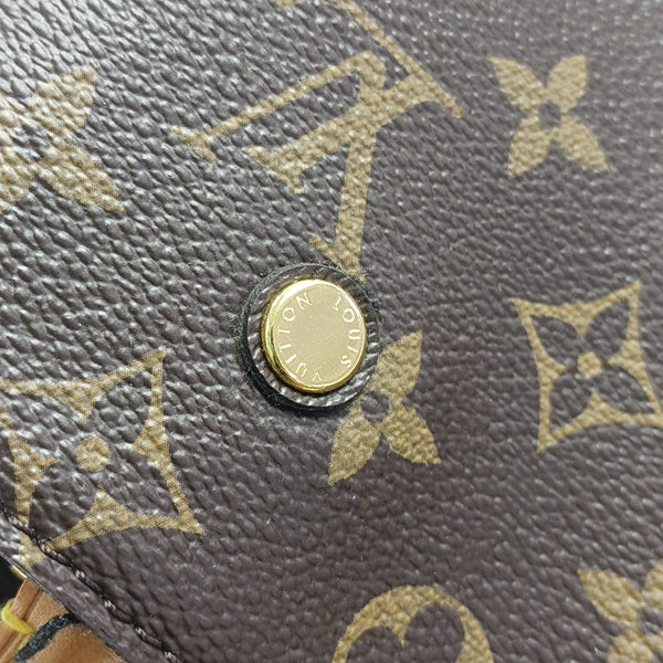 MONTAIGNE Monogram Coated Canvas Brown
