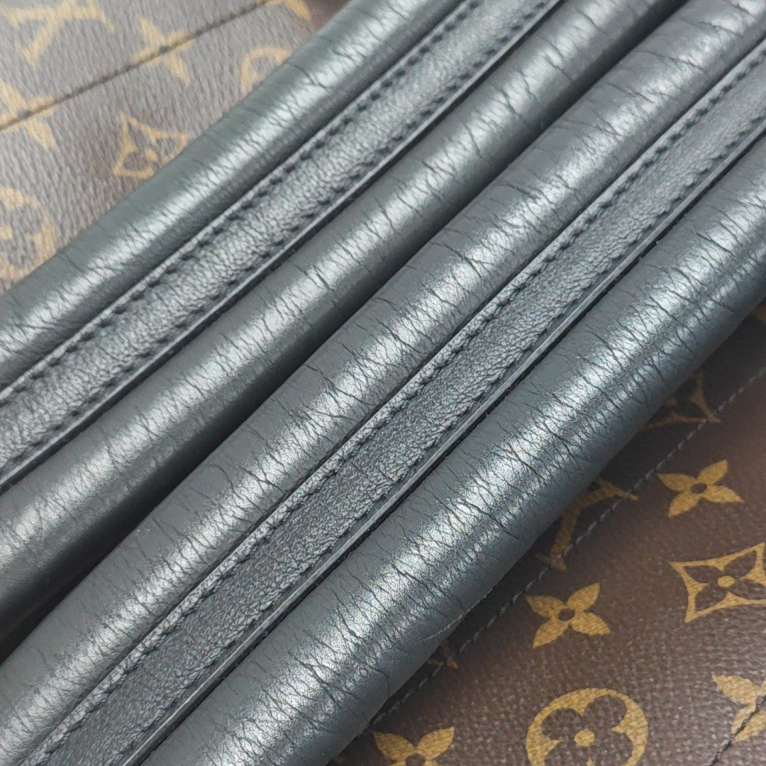 Monogram Coated Canvas Backpack Brown