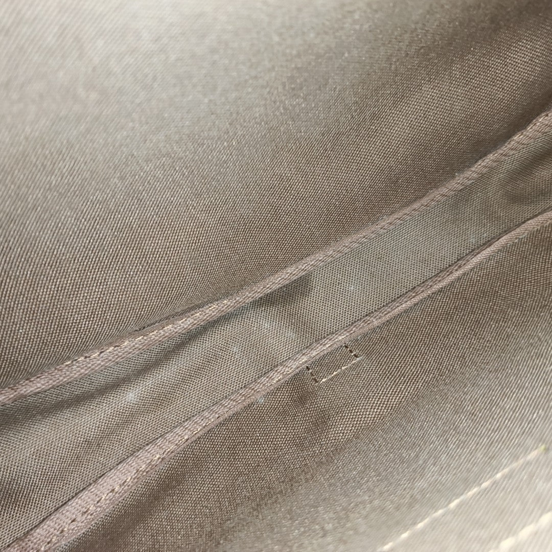 SAUMUR 30 Monogram Coated Canvas Brown