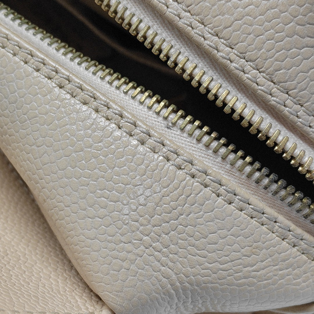 CHANEL PETITE Quilted Grained Calfskin Beige