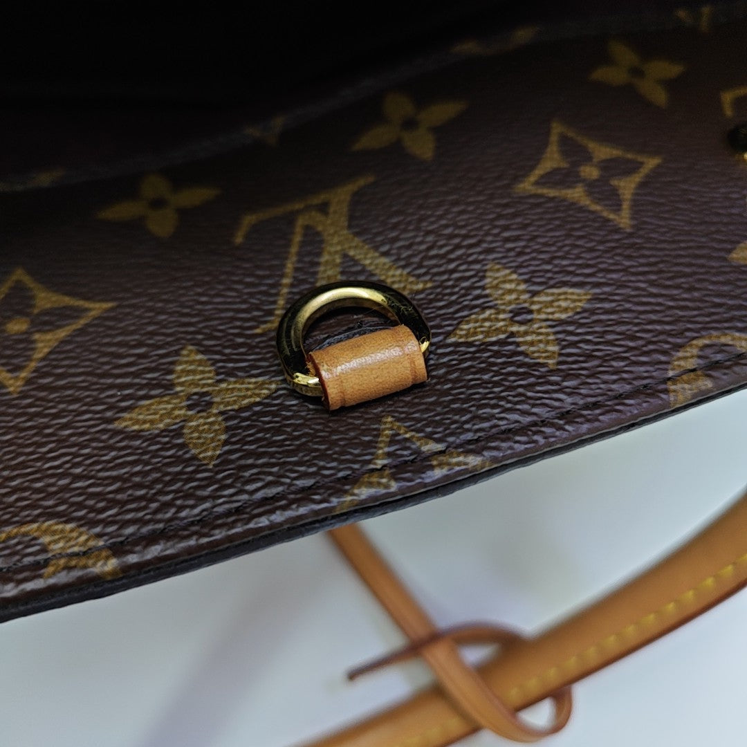 MONTAIGNE Monogram Coated Canvas Brown