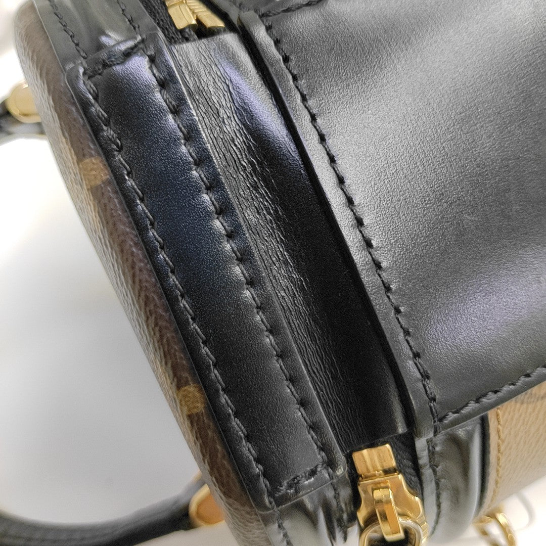 CANNES PM Monogram Coated Canvas Brown
