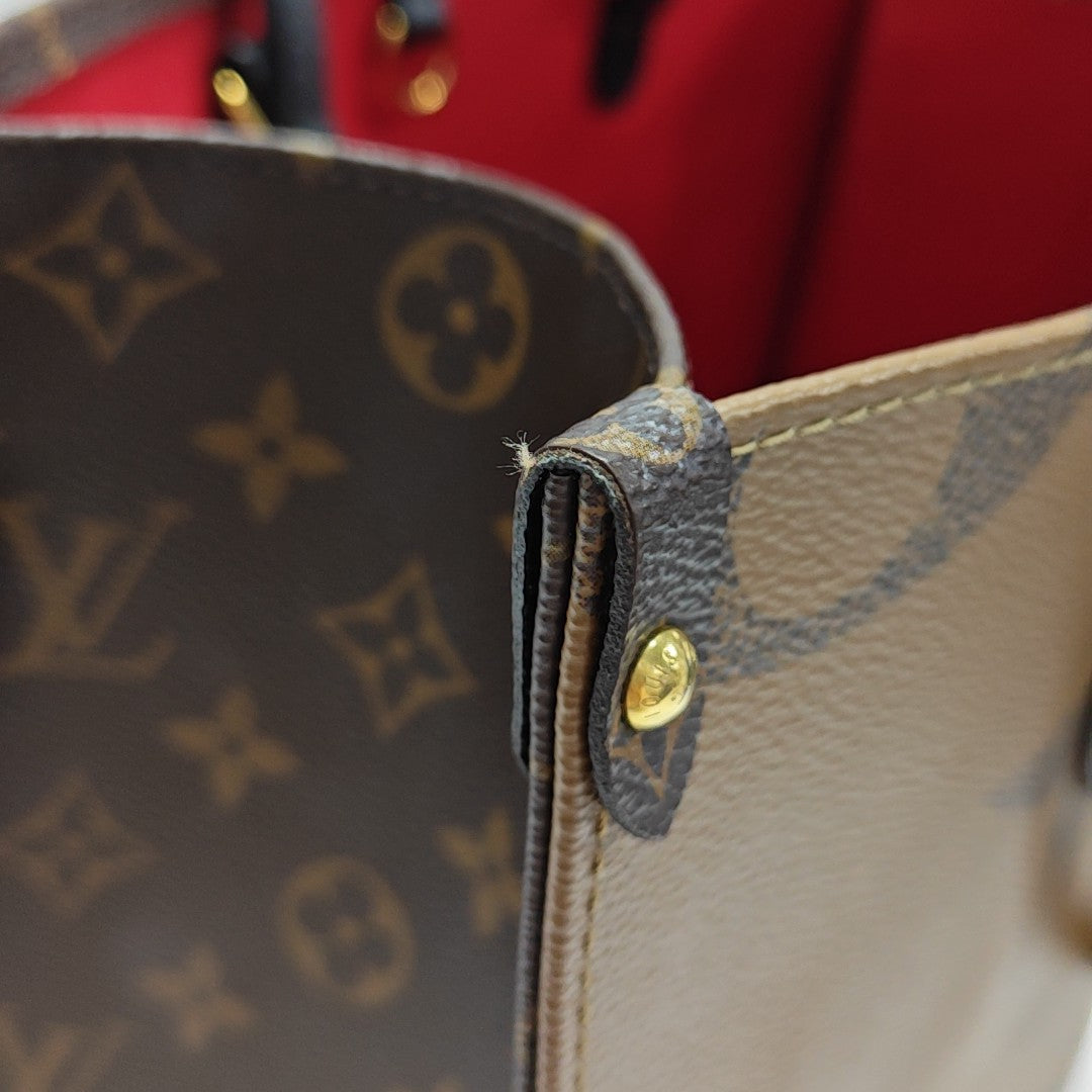 ONTHEGO MM Monogram Coated Canvas Brown