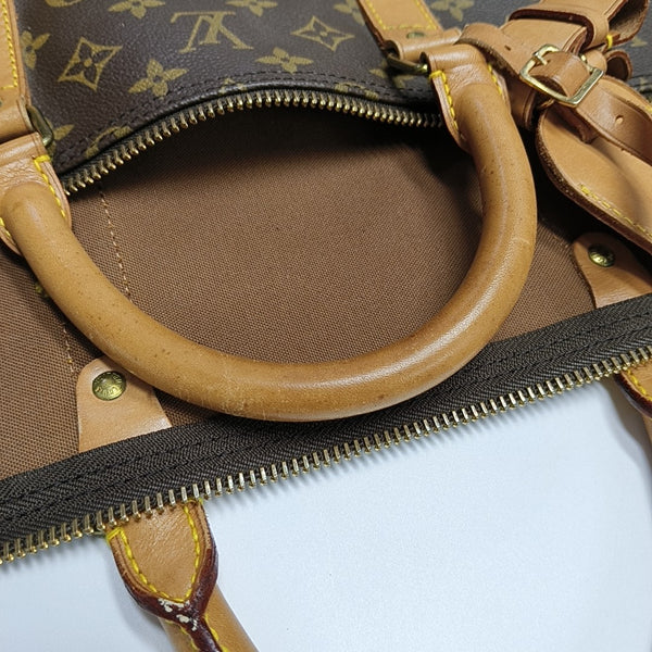 KEEPALL 60 Monogram Coated Canvas Brown