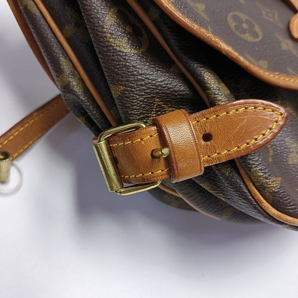SAUMUR Monogram Coated Canvas Brown