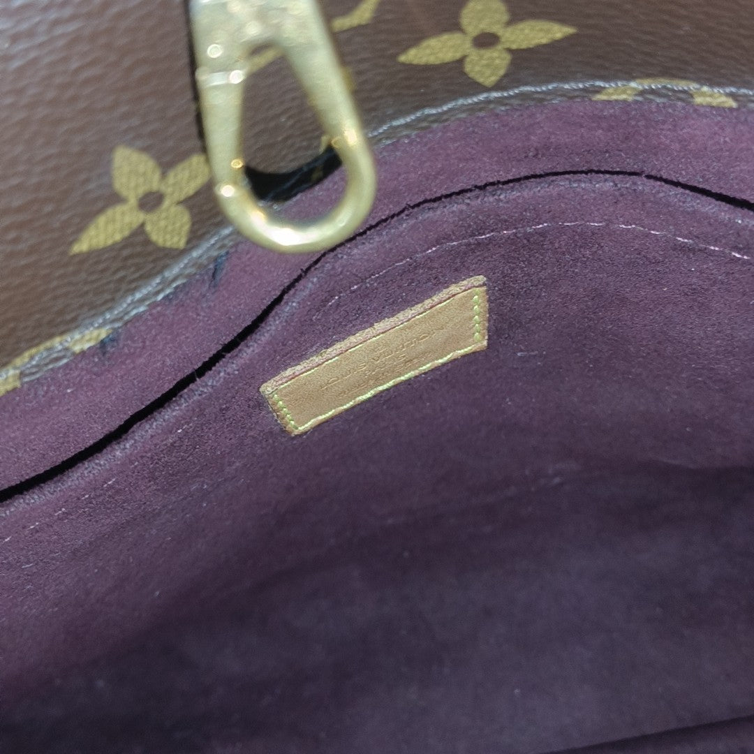 MONTAIGNE Monogram Coated Canvas Brown