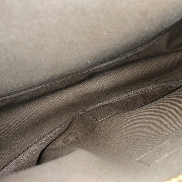 SAUMUR 35 Monogram Coated Canvas Brown