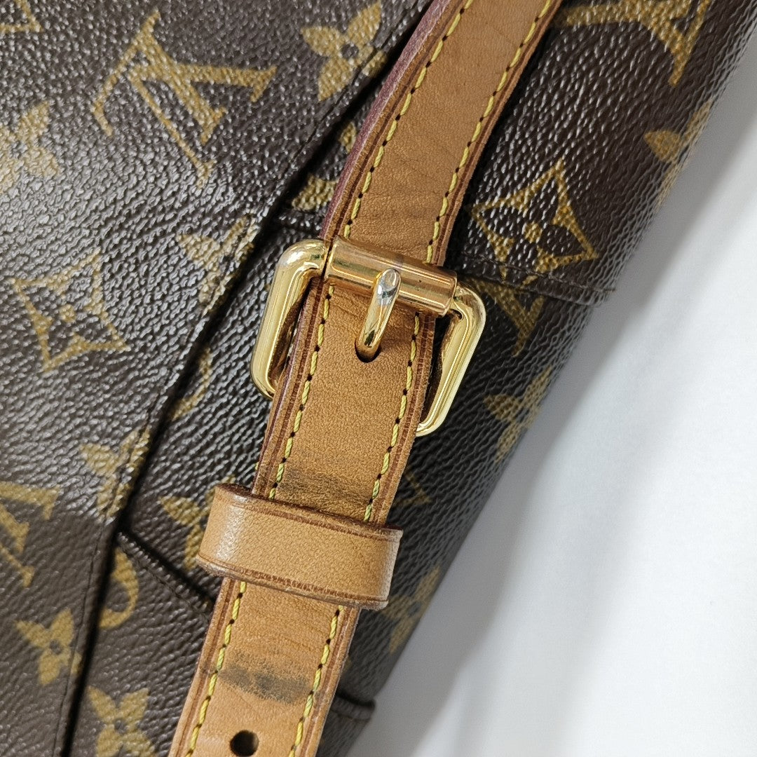 MENILMONTANT PM Monogram Coated Canvas Brown