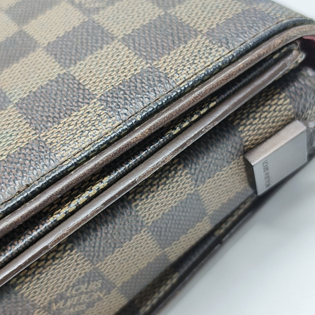 TRIBECA Damier Ebene Coated Canvas Brown