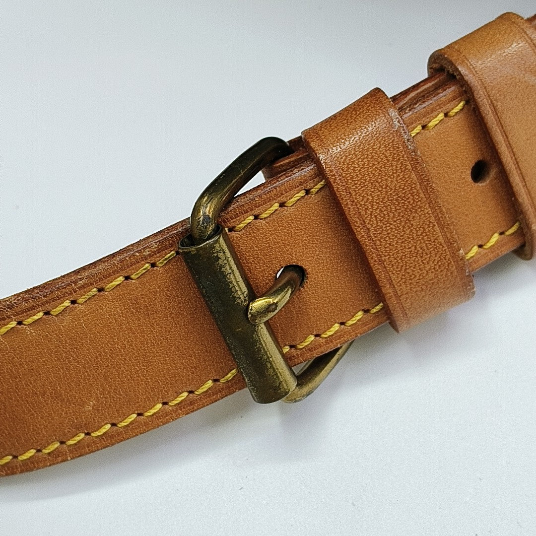 SAUMUR Monogram Coated Canvas Brown