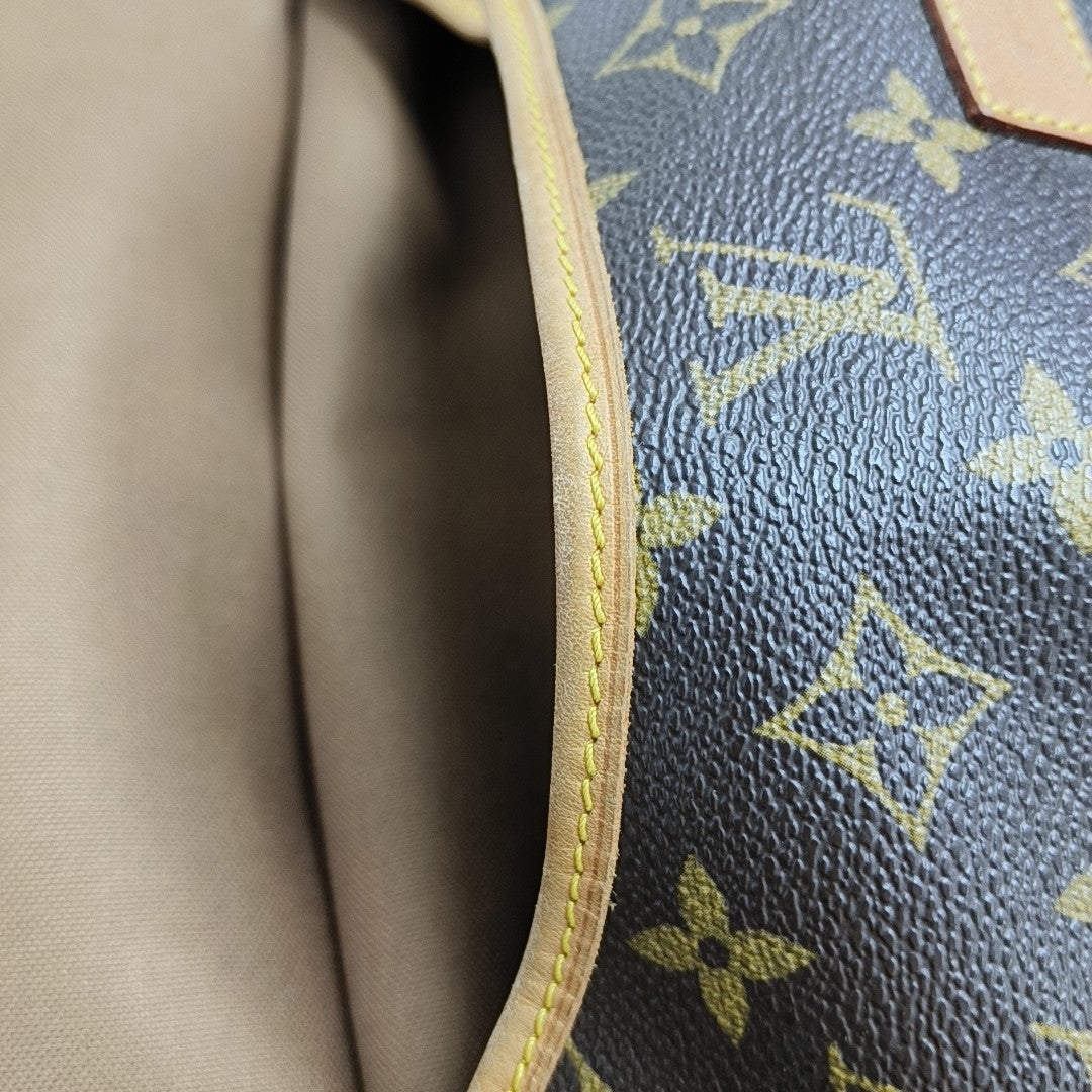 SAUMUR Monogram Coated Canvas Brown
