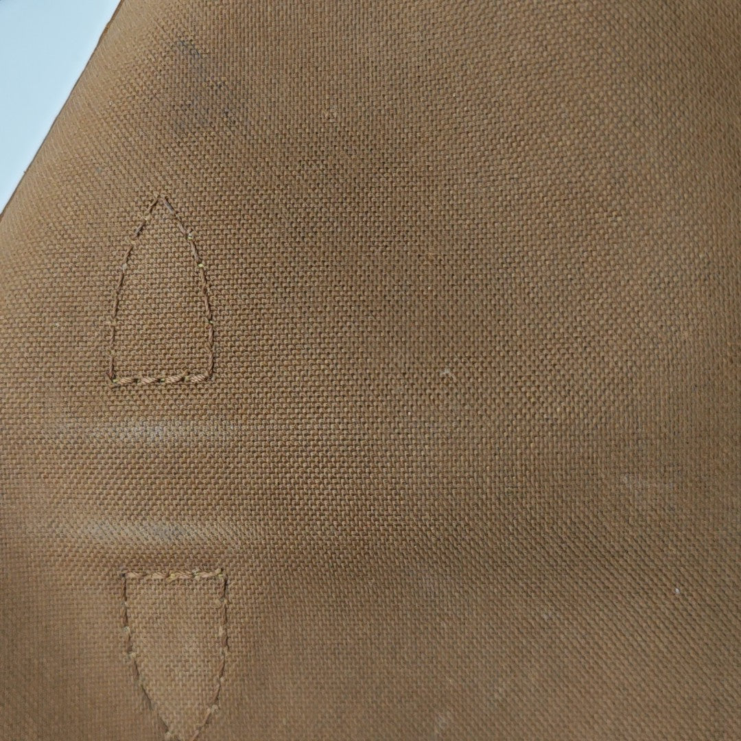 SAUMUR Monogram Coated Canvas Brown