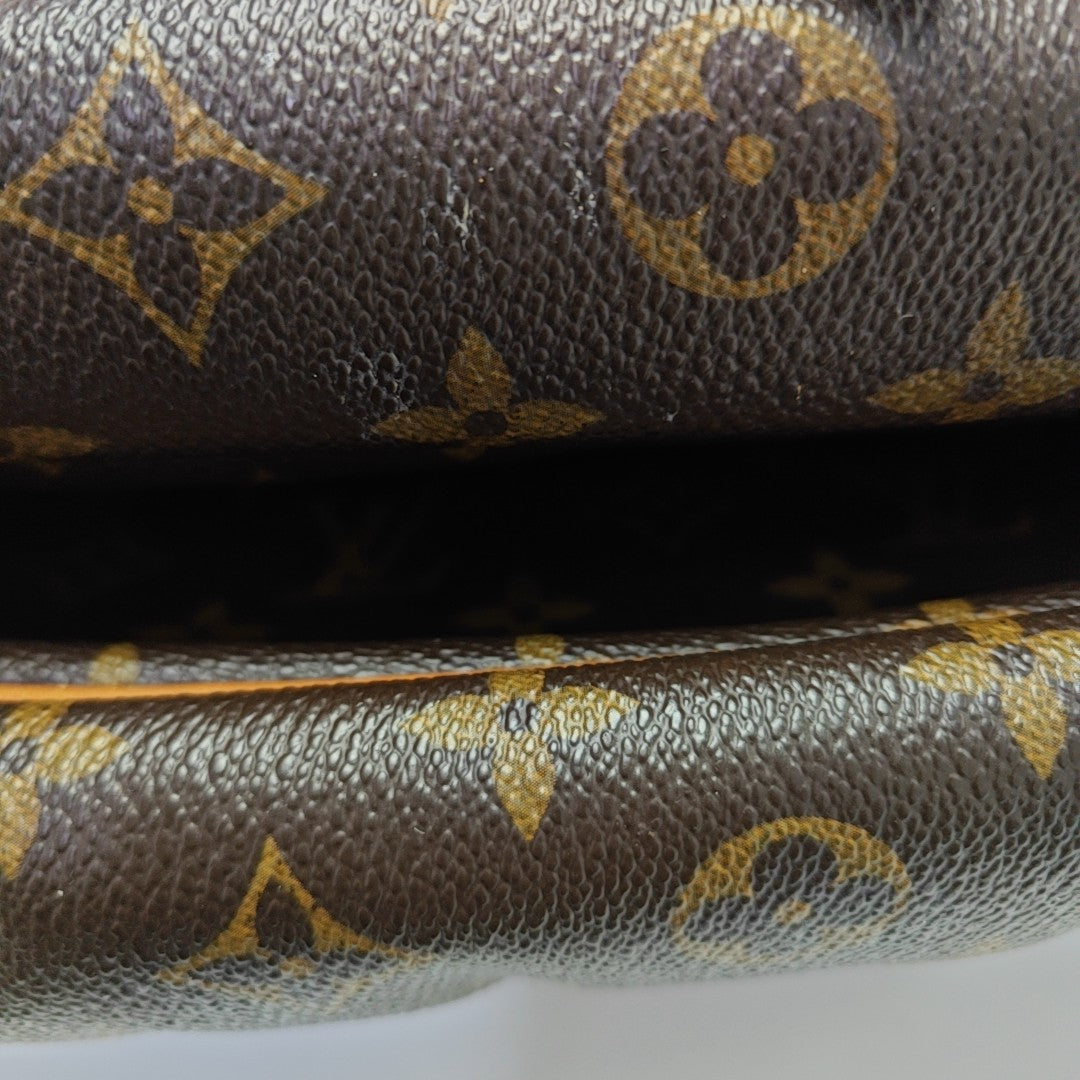 SAUMUR Monogram Coated Canvas Brown