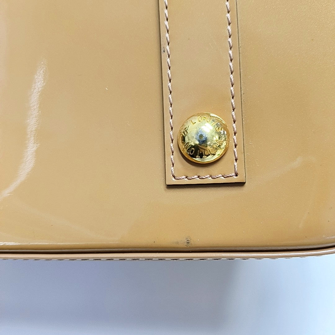 Authenticated pre-owned  Alma PM Patent Leather Beige - Top Handle Bag at Looply