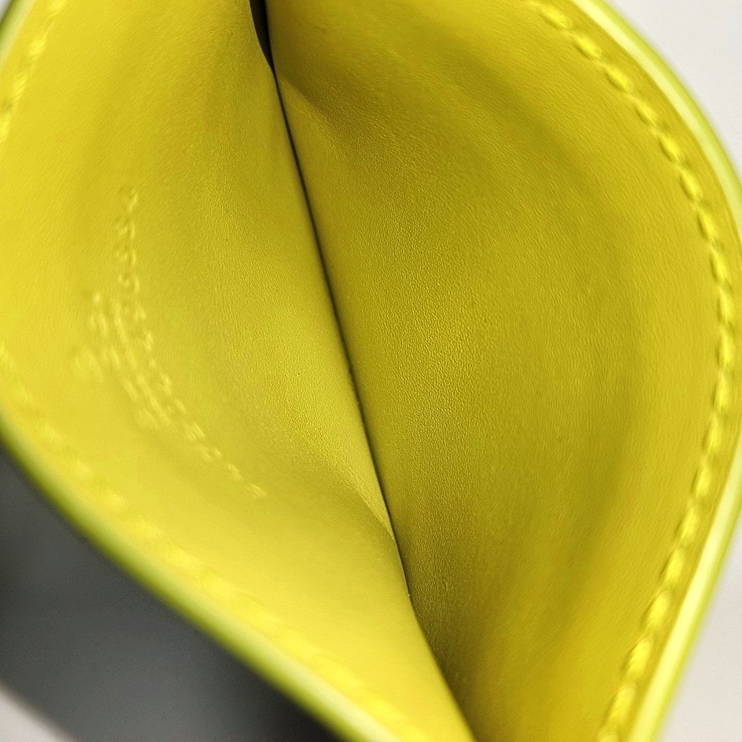 Authenticated pre-owned  Microguccissima Monogram Calfskin Yellow Card Holder - Card Holder at Looply