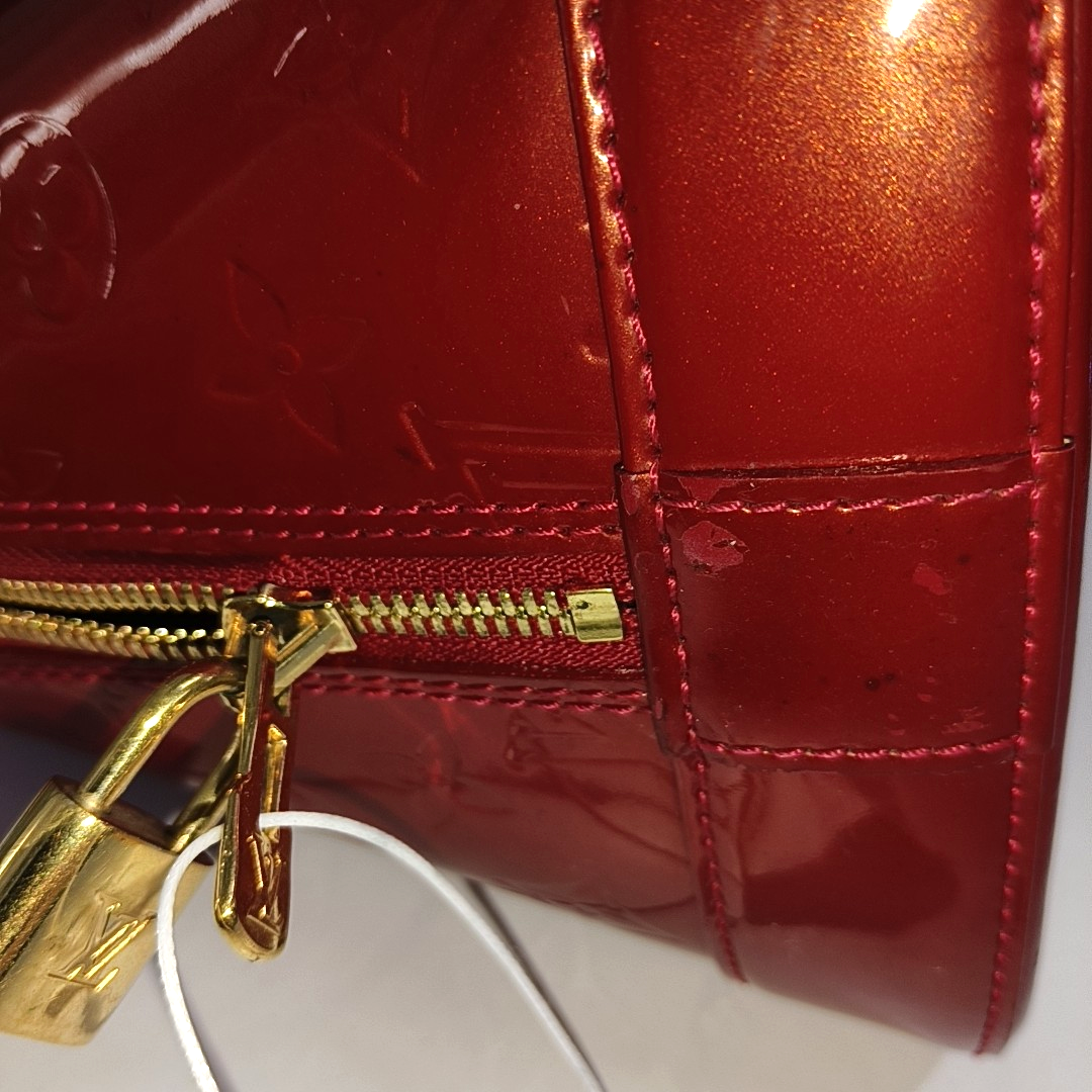 Authenticated pre-owned  Alma GM Patent Leather Red - Top Handle Bag at Looply