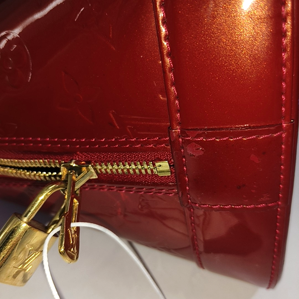 Authenticated pre-owned  Alma GM Patent Leather Red - Top Handle Bag at Looply